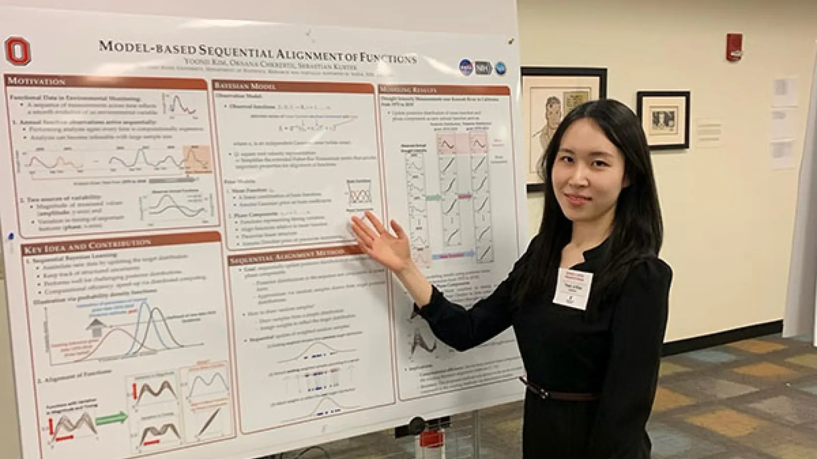 Yoonji Kim with her poster at the Hayes Graduate Research Forum